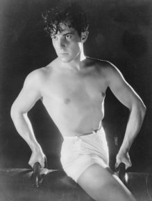 circa 1925: Mexican heartthrob Ramon Novarro (1899 - 1968) on a gymnasium horse. (Photo by General Photographic Agency/Getty Images)